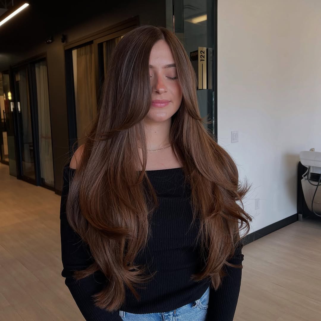 Glamorous Long Brunette Layers With Face Framing Bangs