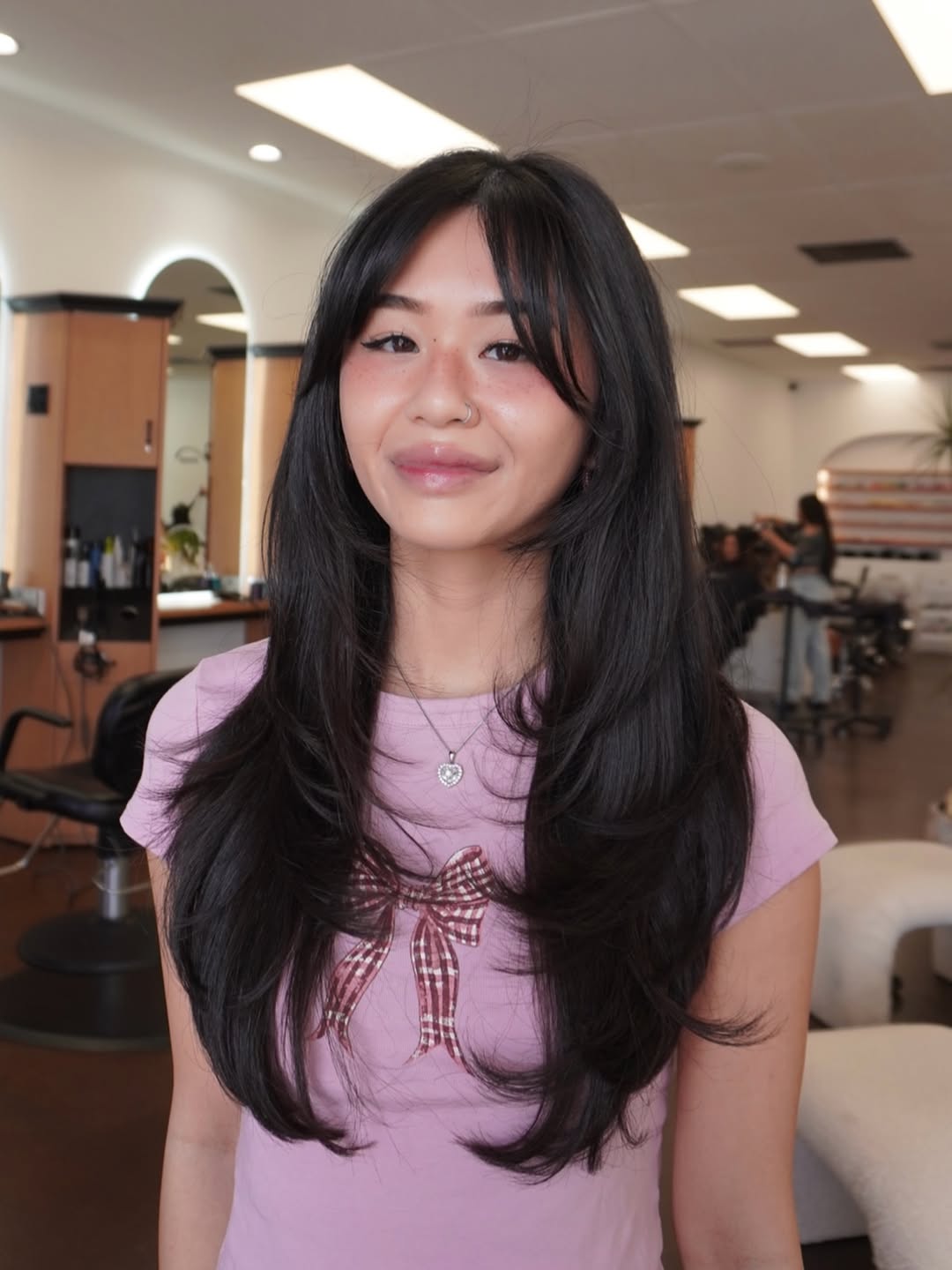 Glamorous Long Feathered Layers With Curtain Bangs