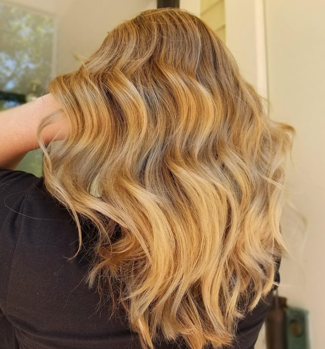 Golden Honey Blonde Waves With Subtle Dimension