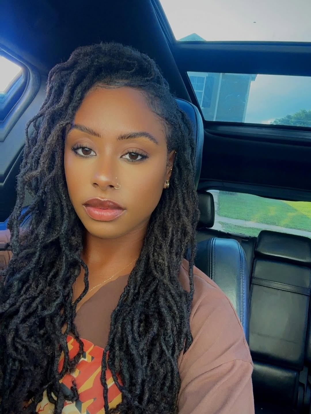 Gorgeous Mid-Back Locs With Styled Edges