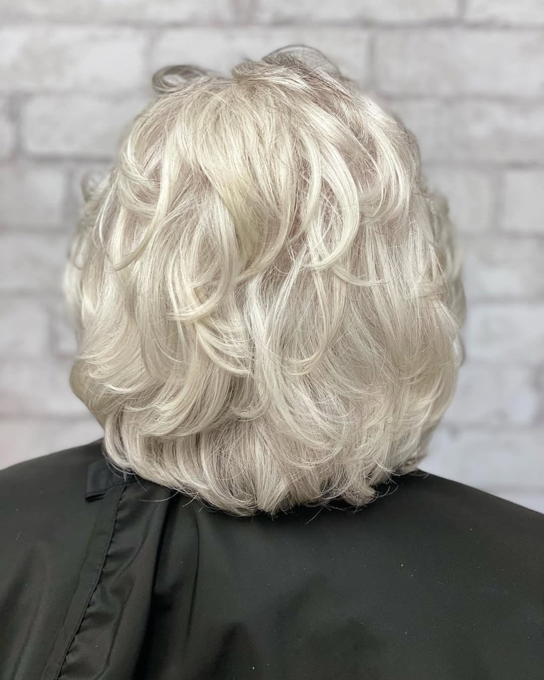 Gorgeous Silver Medium Layers With Bouncy Curls