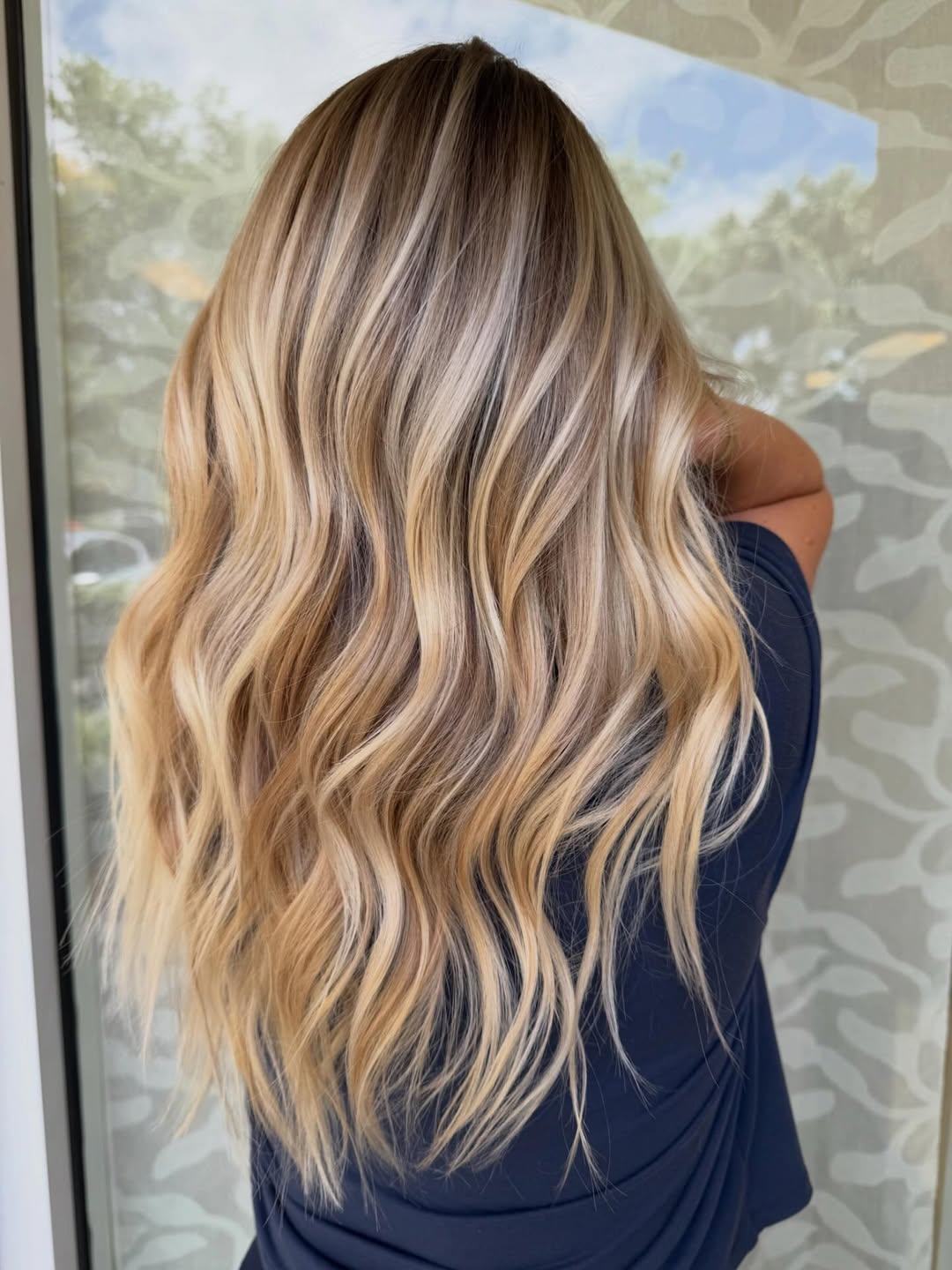 Honey Blonde Balayage With Lived-In Beach Waves