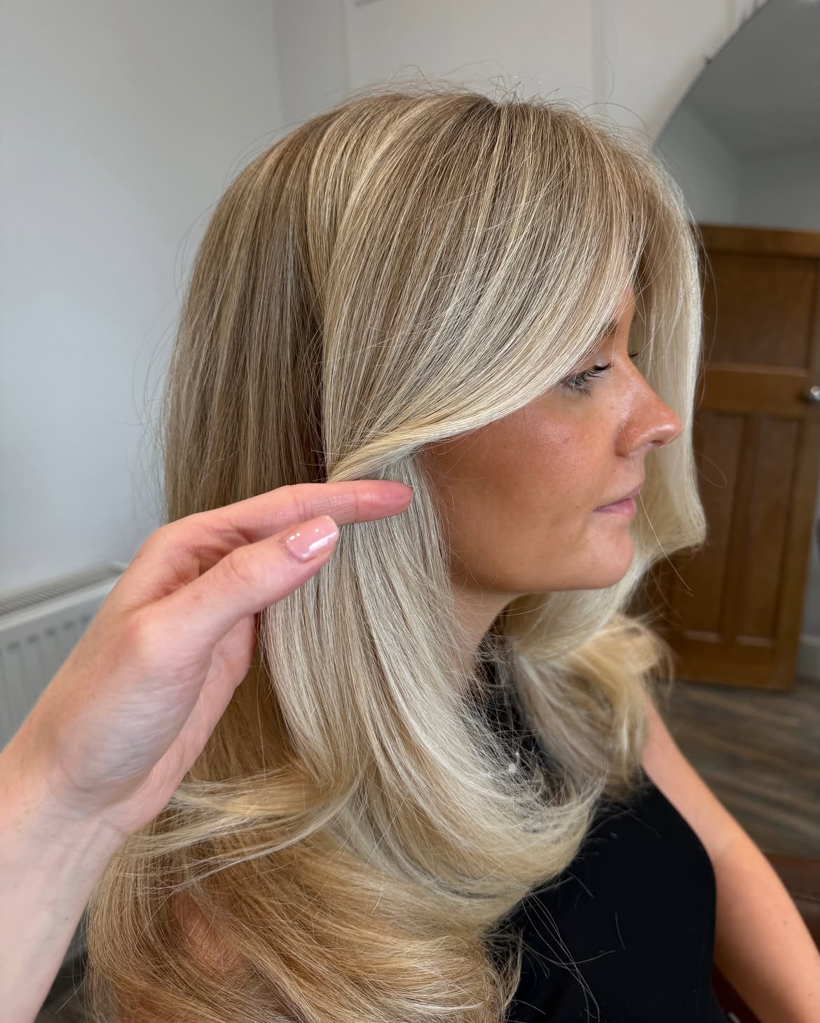 Honey Blonde Layers With Soft Curtain Bangs