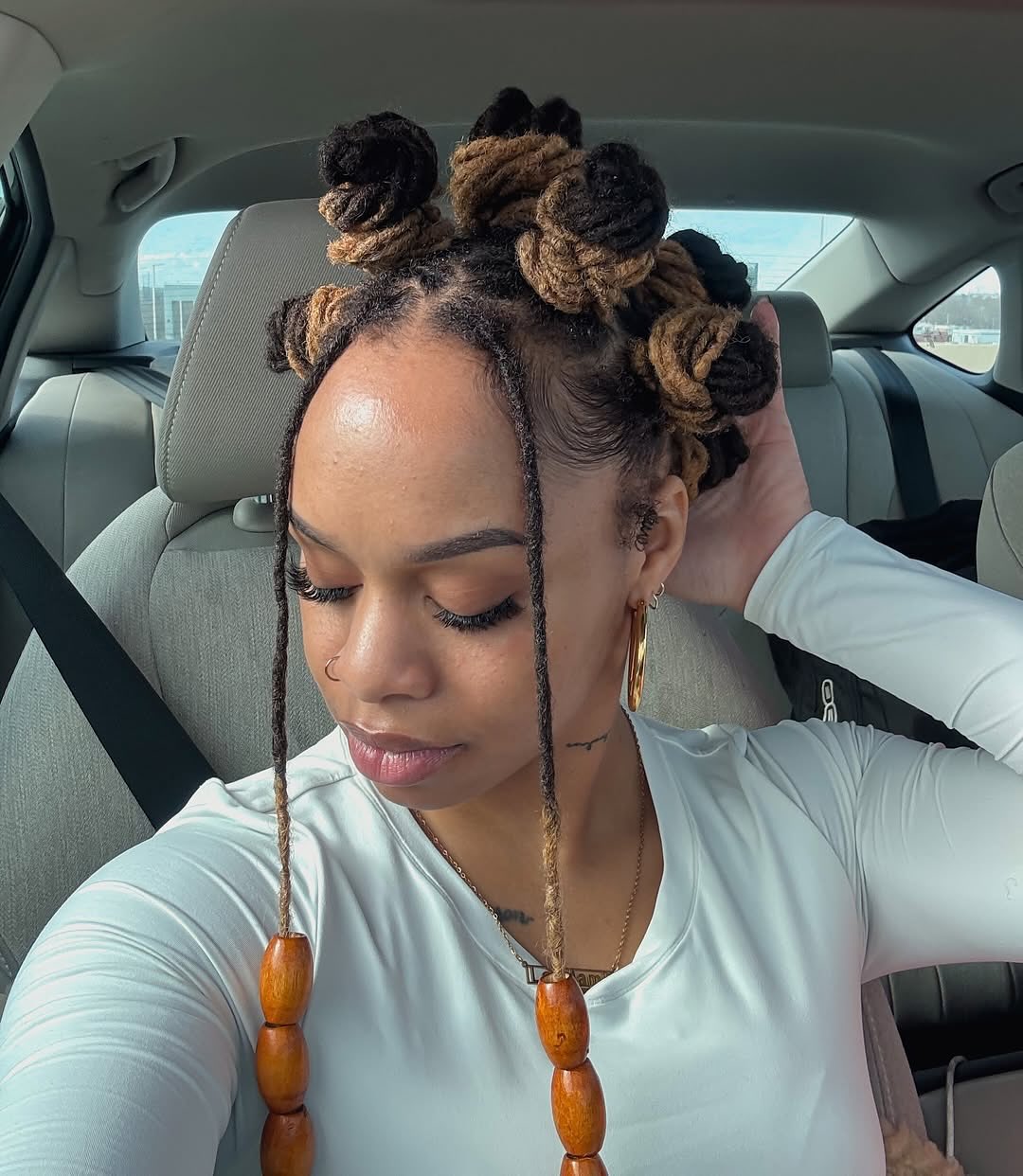 Honey Blonde Loc Knots with Beaded Face-Framing Locs