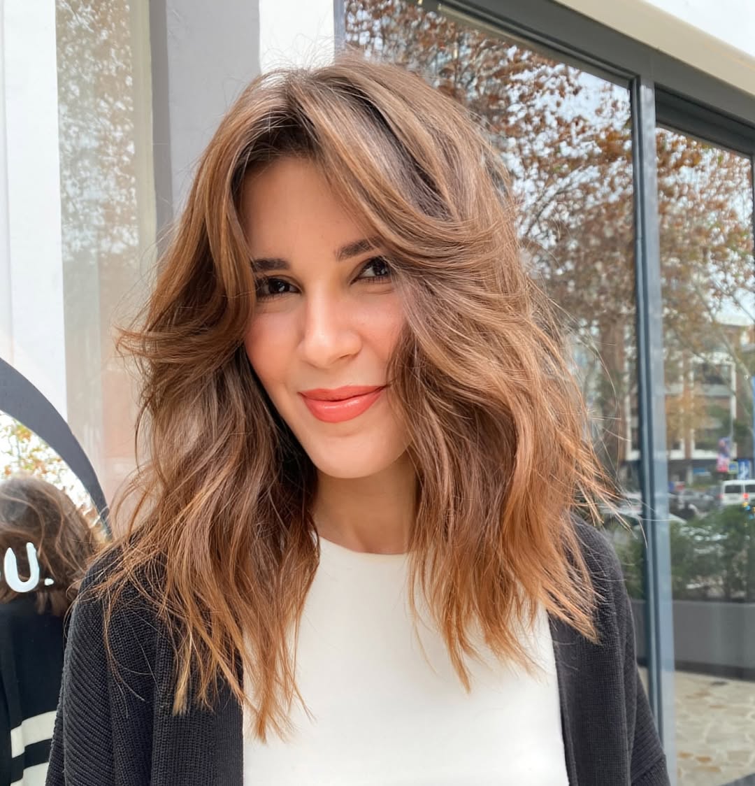Honey Cinnamon Lob with Voluminous Waves and Curtain Bangs