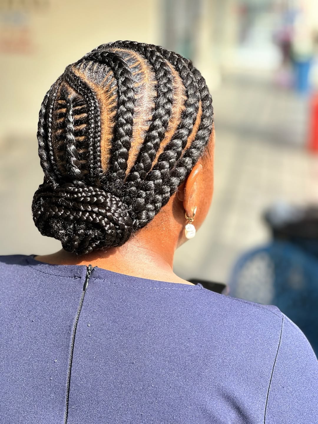 Intricate Cornrow Braids Into Low Bun