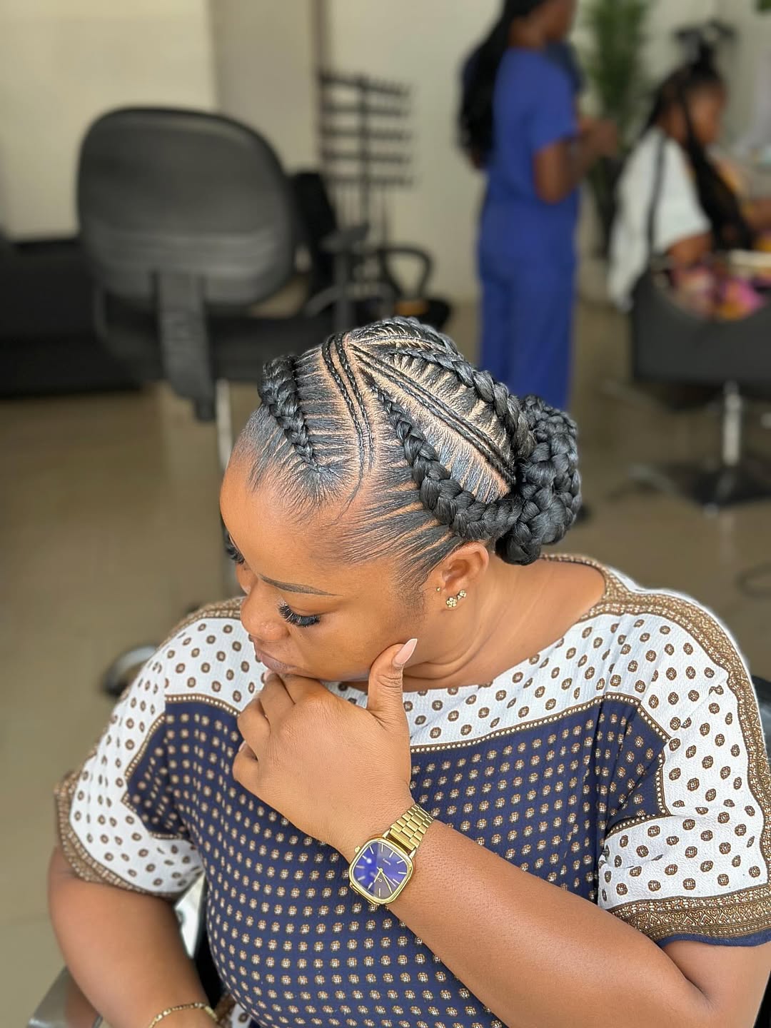 Intricate Cornrow Braids Into Low Double Buns
