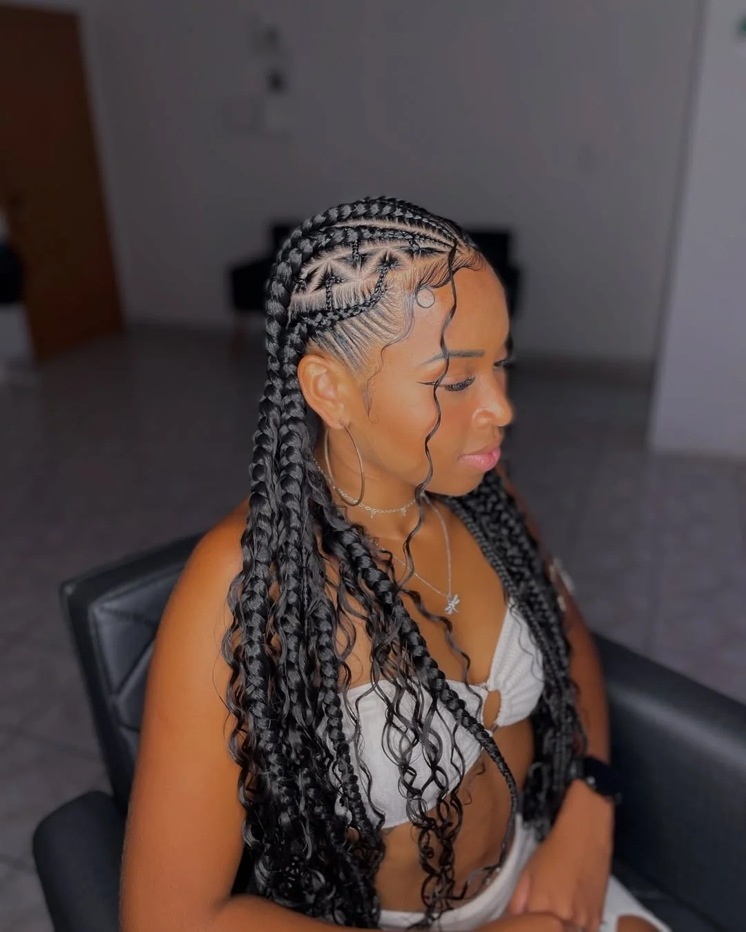 Intricate Cornrows With Flowing Bohemian Braids