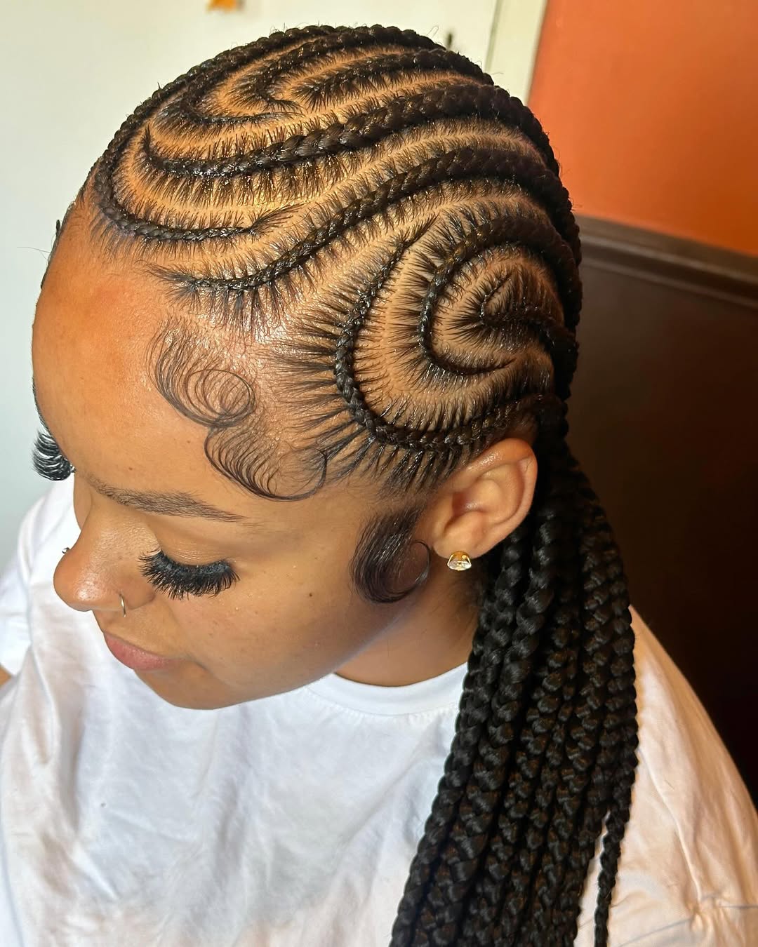 Intricate Cornrows With Laid Edges And Long Braids