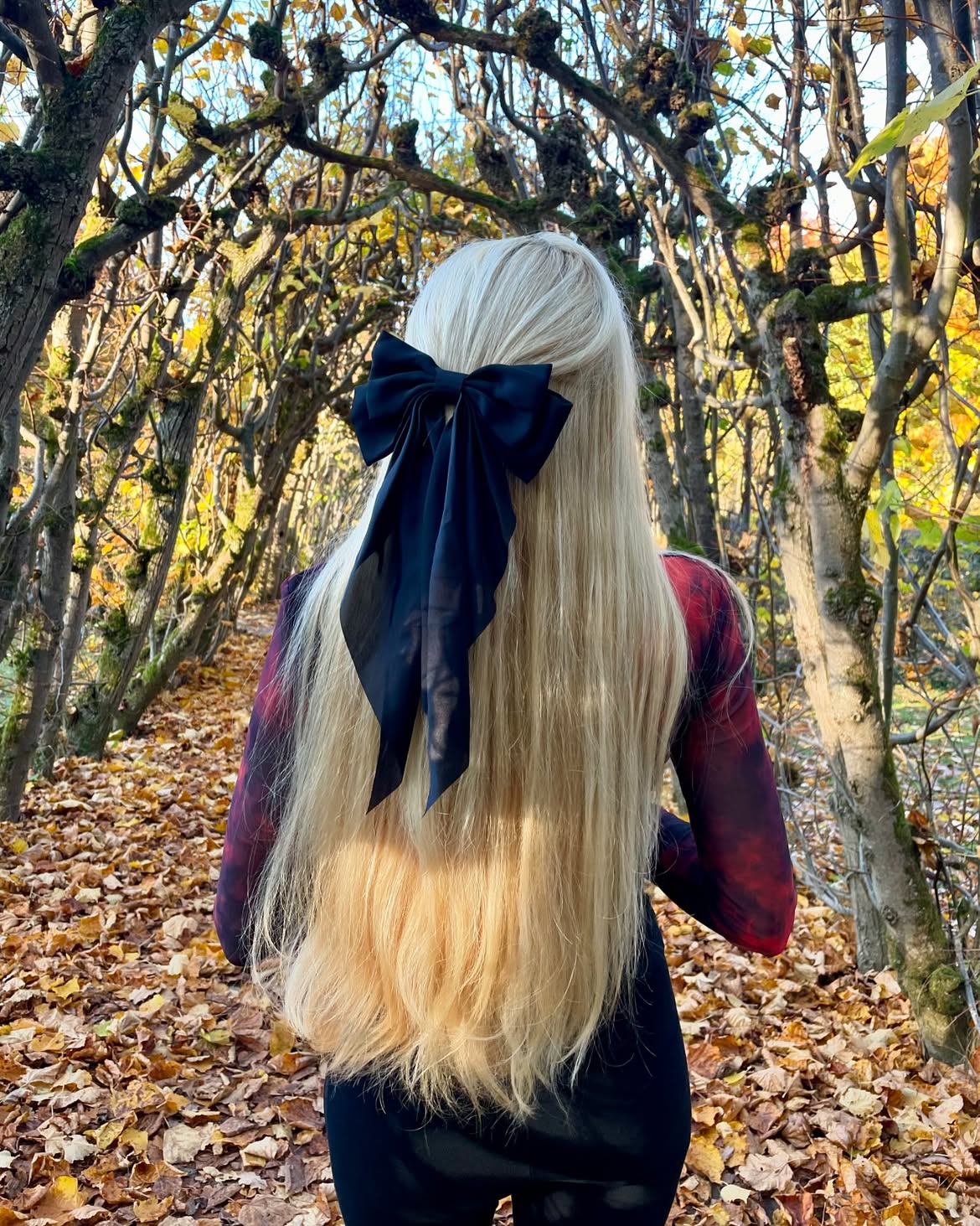 Long Platinum Blonde Hair With Black Bow