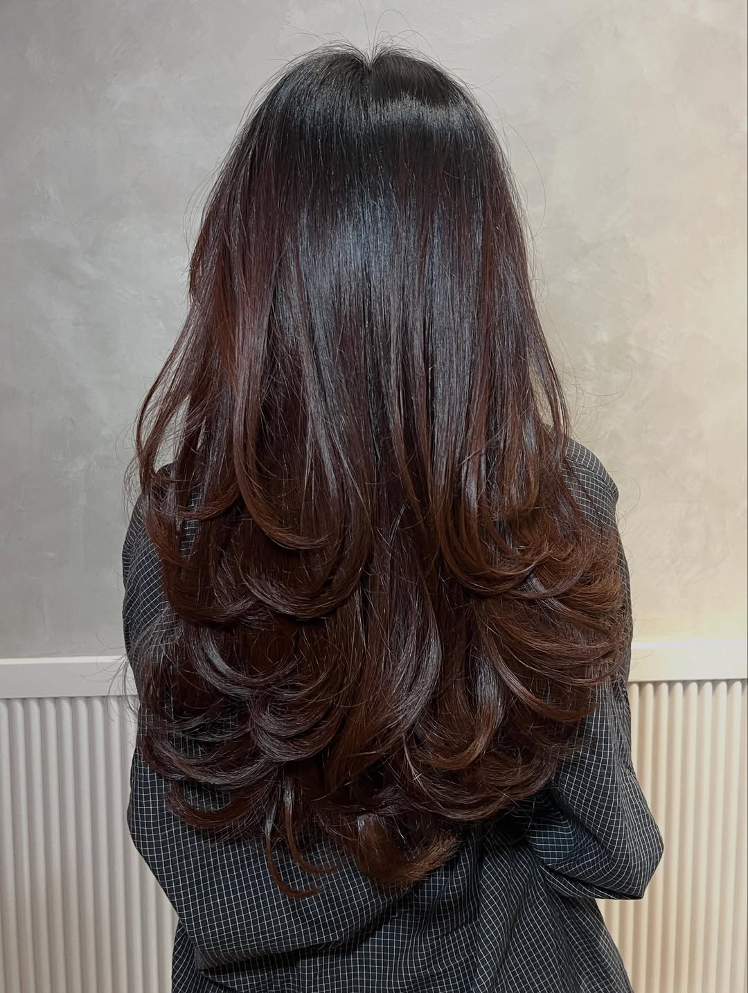Maxi Length Layered Cut With Voluminous Curls