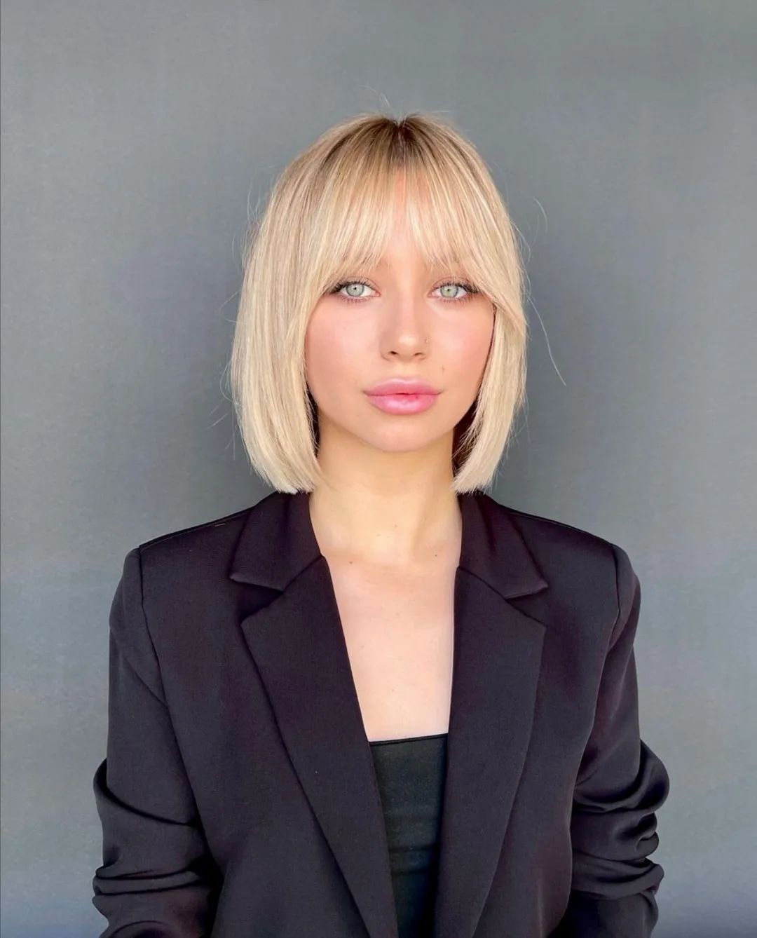 Platinum Blonde Blunt Bob With Wispy Bangs