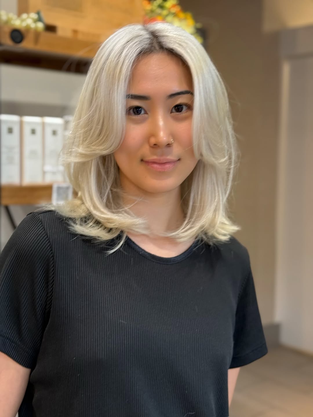 Platinum Blonde Layers with Face-Framing Bangs