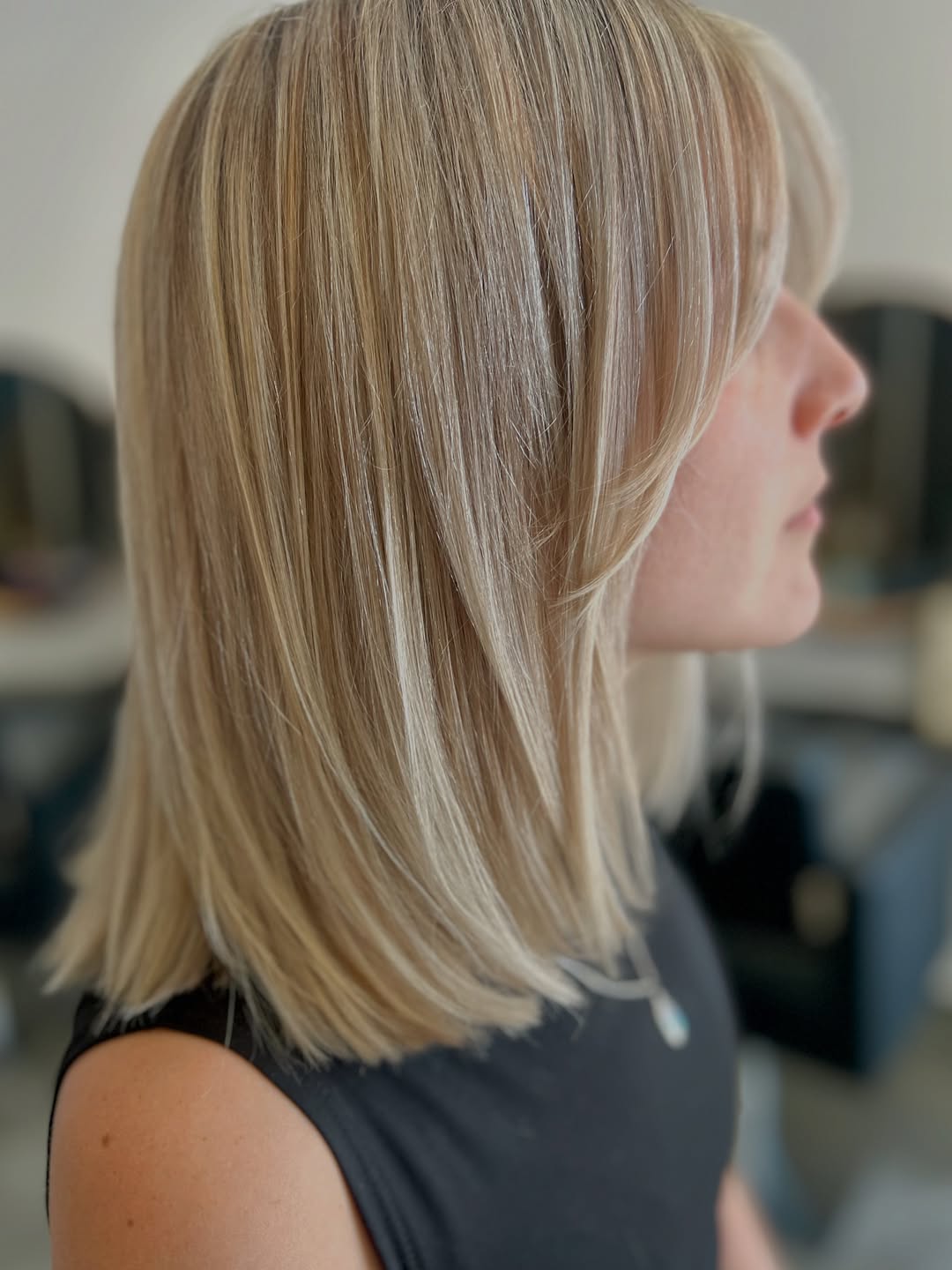 Platinum Blonde Lob With Wispy Curtain Bangs