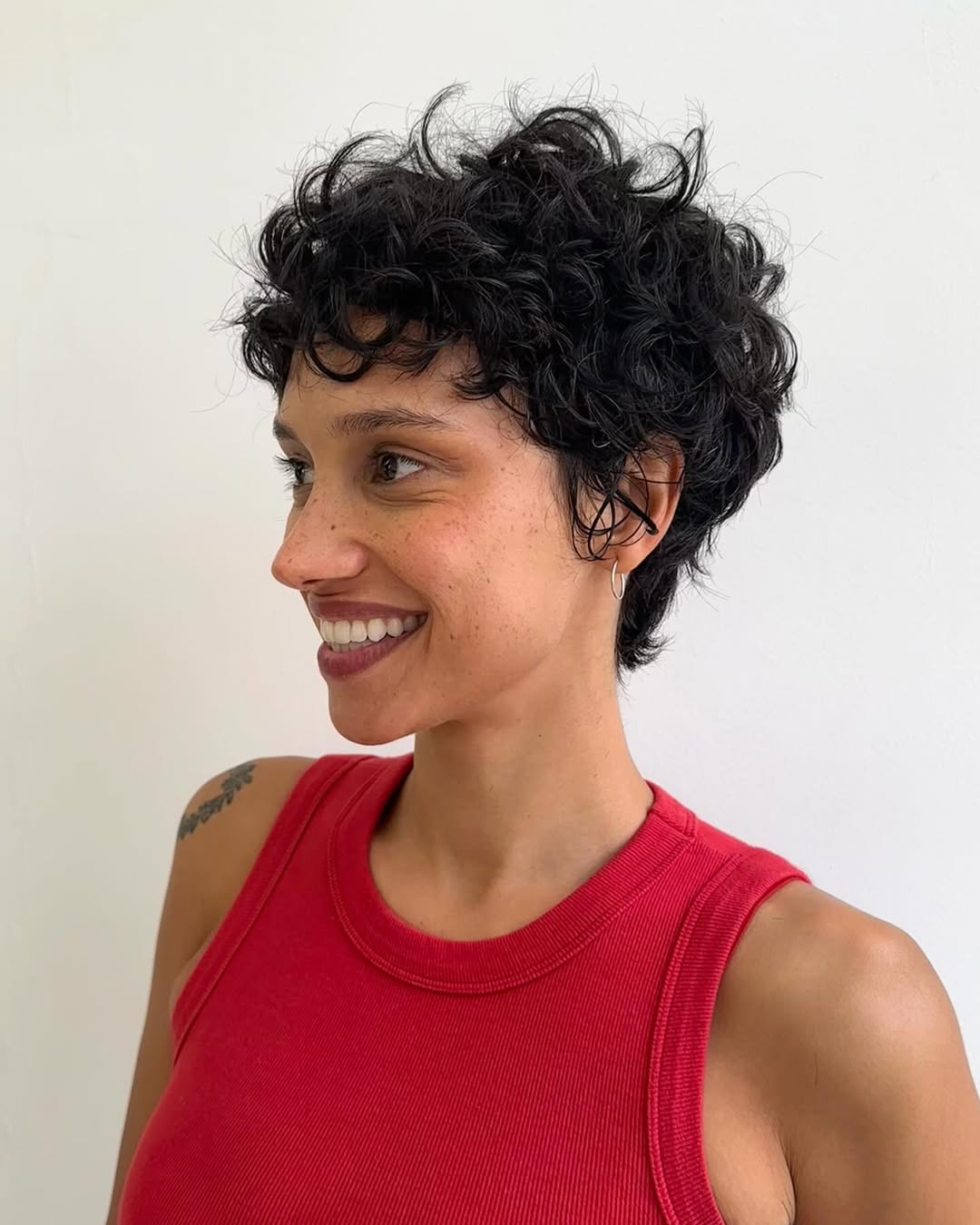 Playful Curly Pixie Cut With Natural Volume