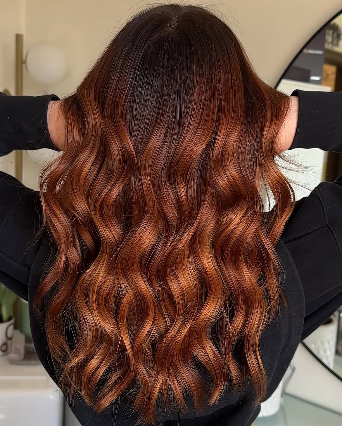 Rich Auburn Balayage With Loose Waves