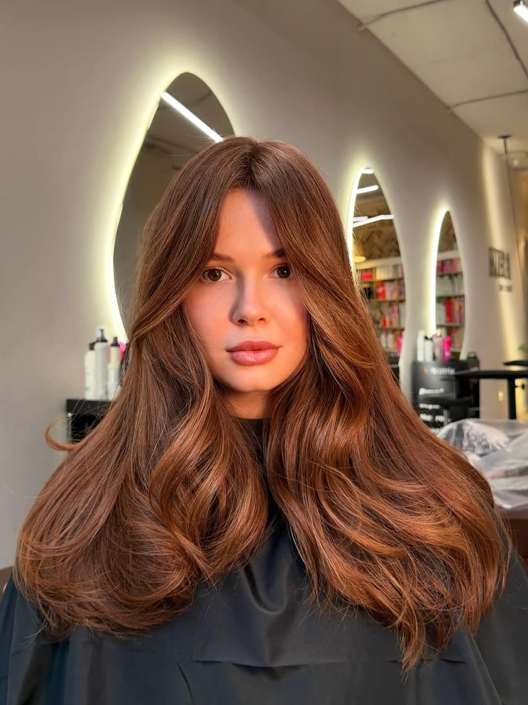 Rich Auburn Waves With Face Framing Layers