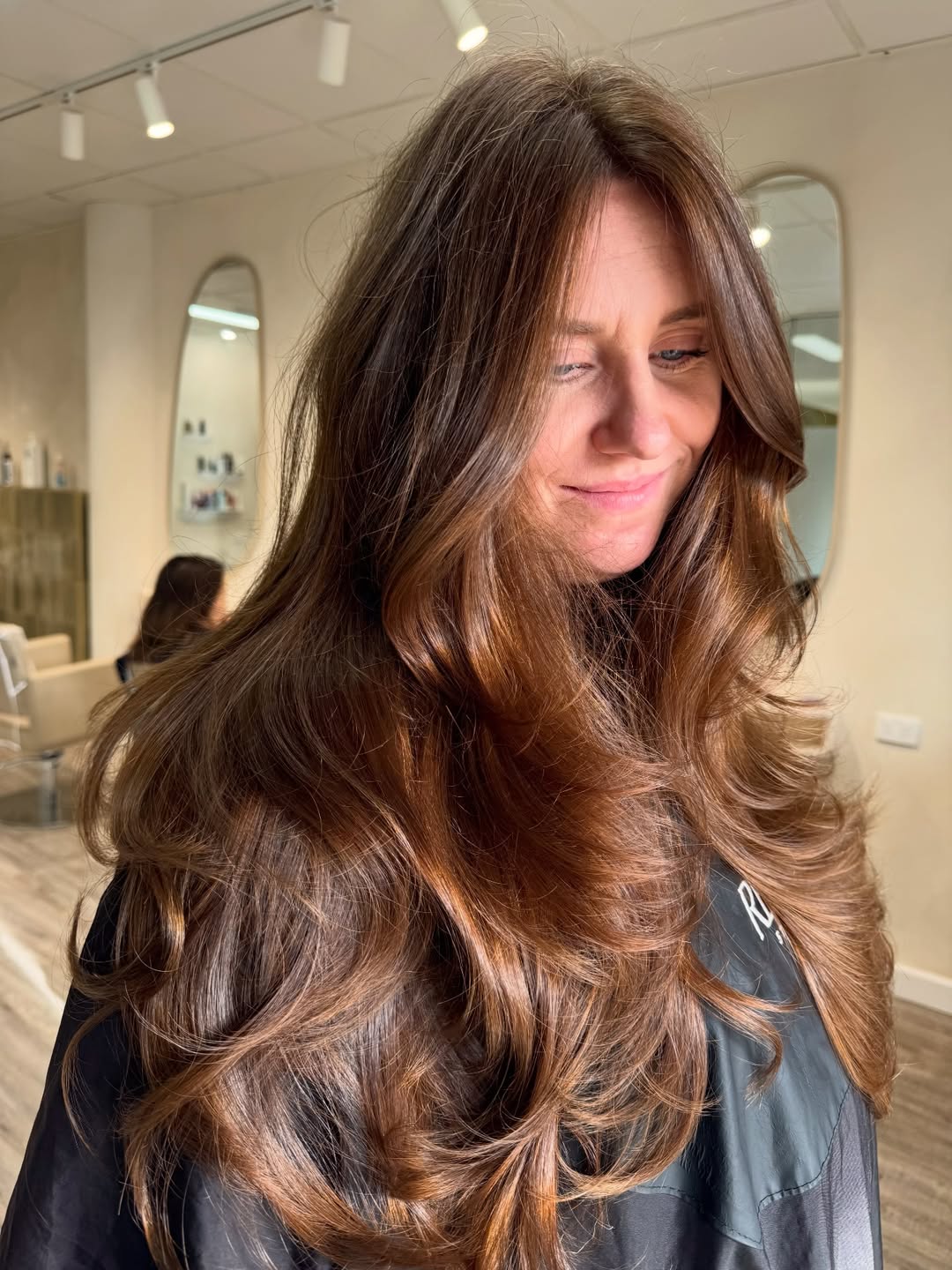 Rich Warm Brunette Layers With Voluminous Waves