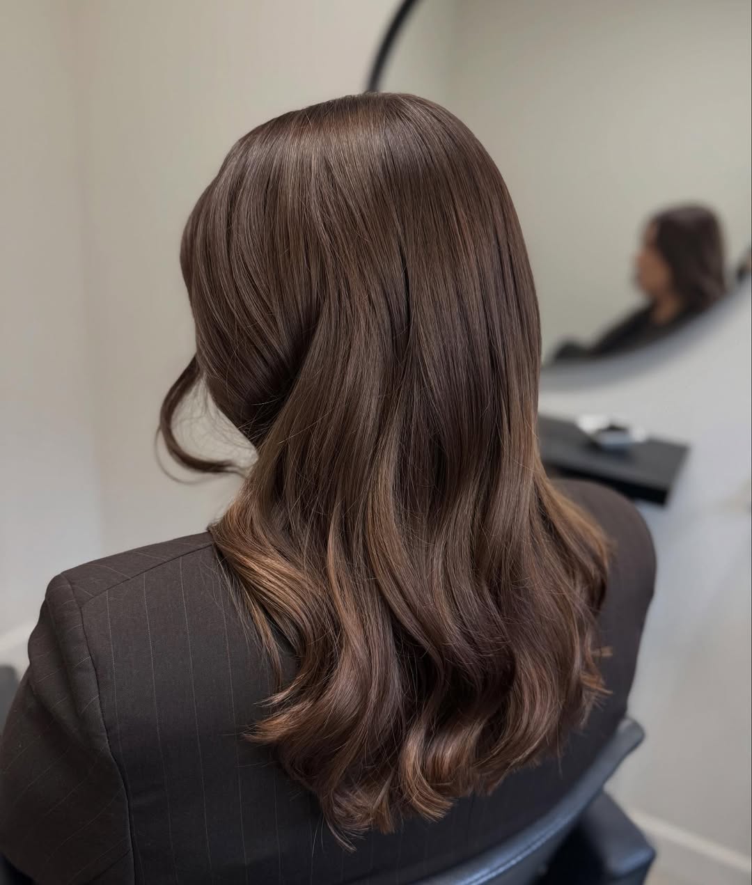 Rich Warm Brunette With Soft Face-Framing Waves