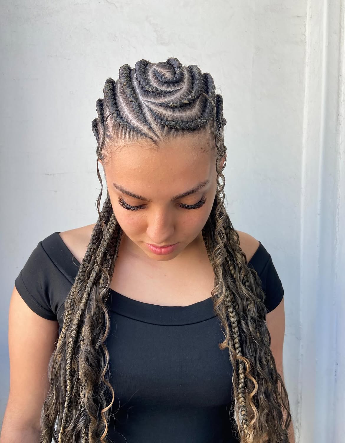 Sculpted Cornrow Rose With Undone Braids