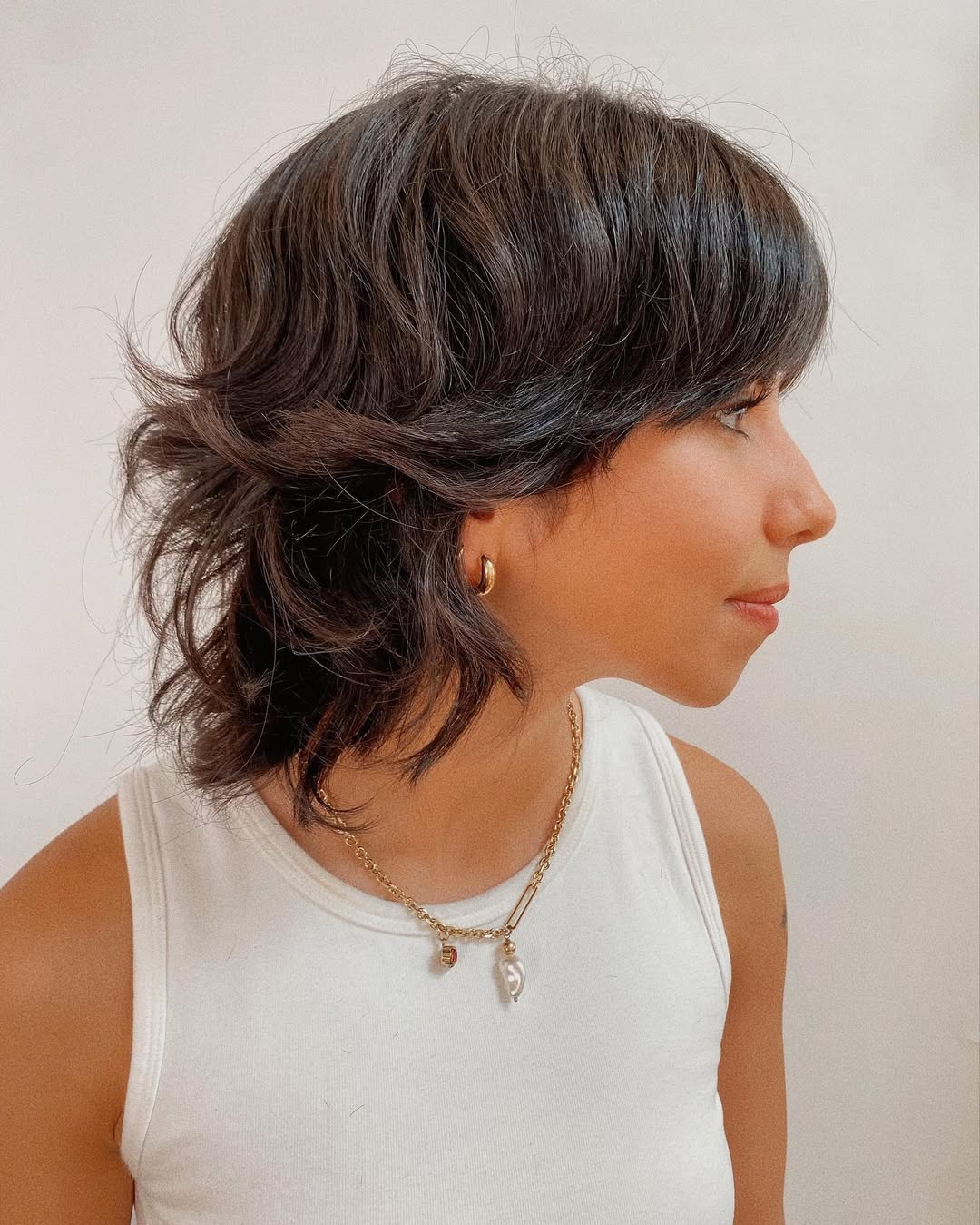 Shaggy Brunette Medium Cut With Wispy Bangs