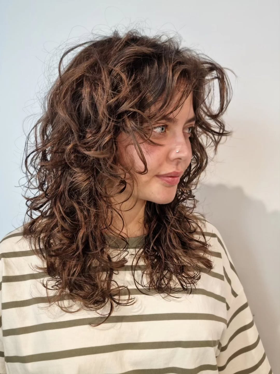 Shaggy Mocha Brunette Layers With Wispy Bangs