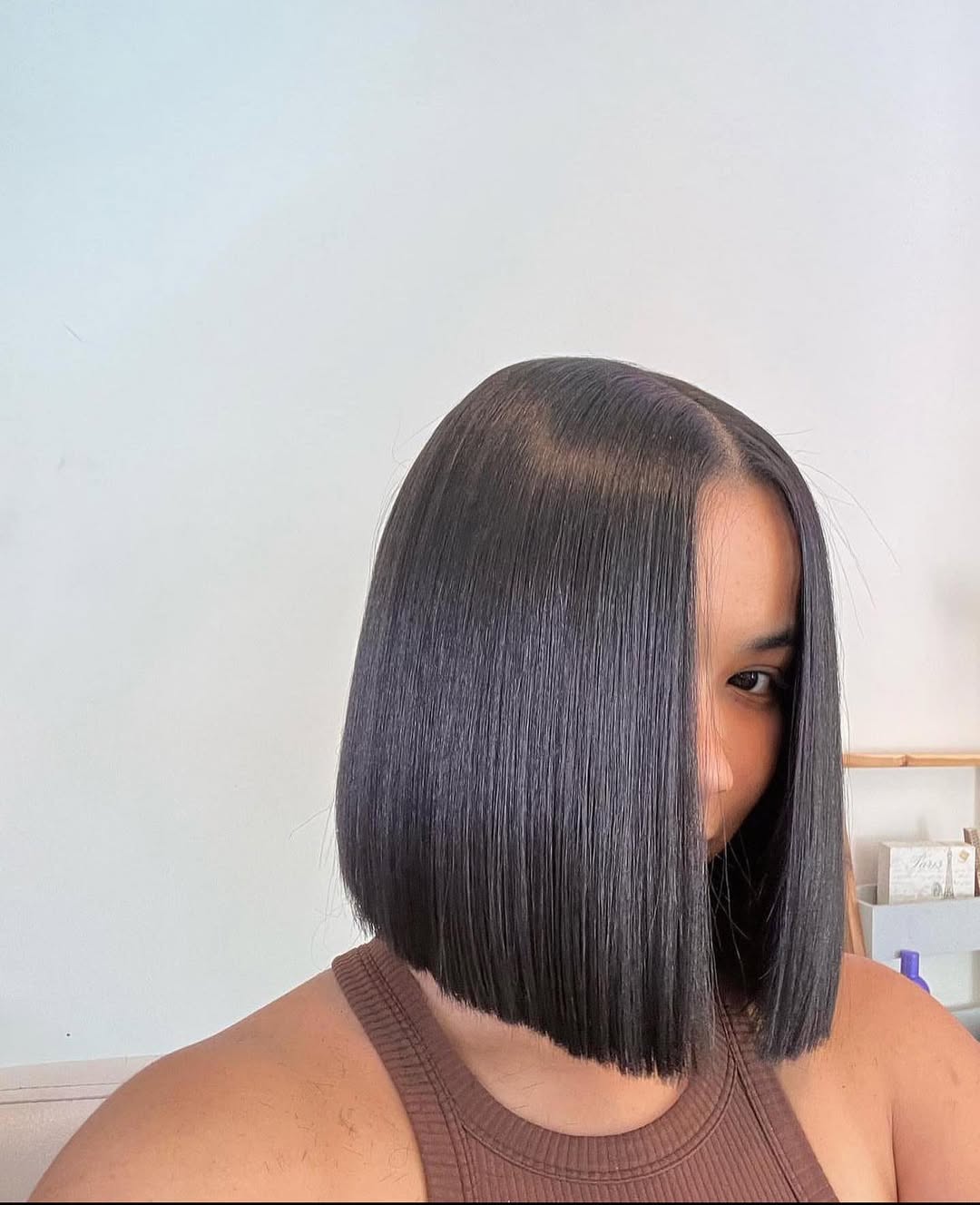 Sleek Blunt Black Bob With Middle Part