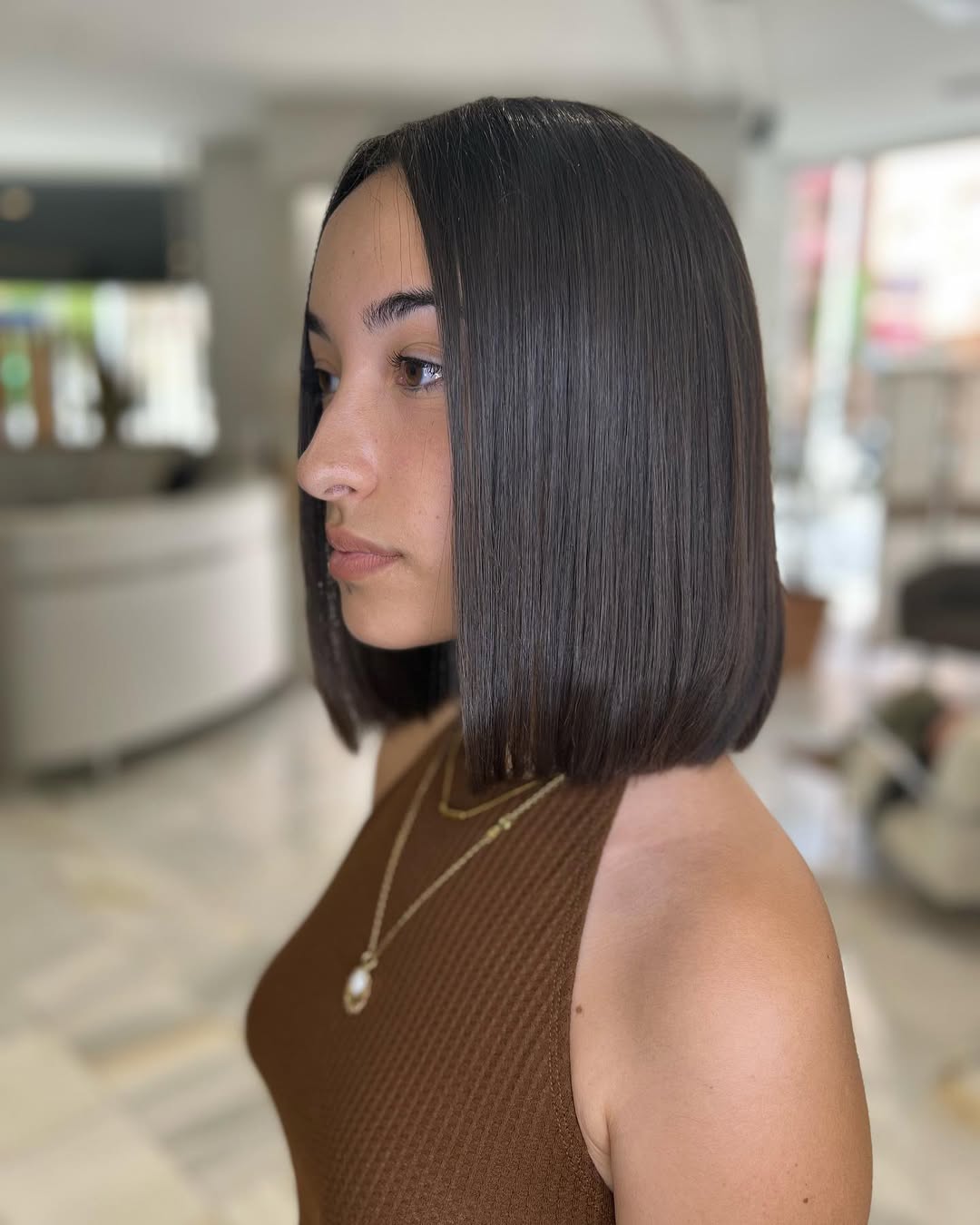 Sleek Blunt Lob With Middle Part