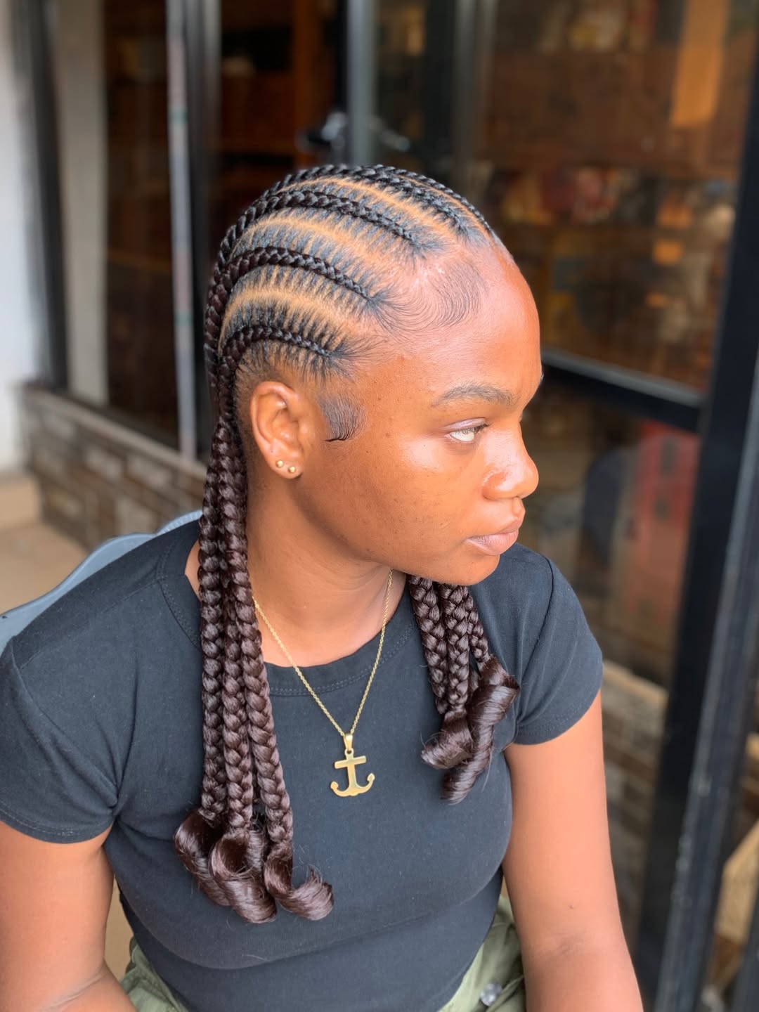 Sleek Cornrows With Curly Ends And Laid Edges