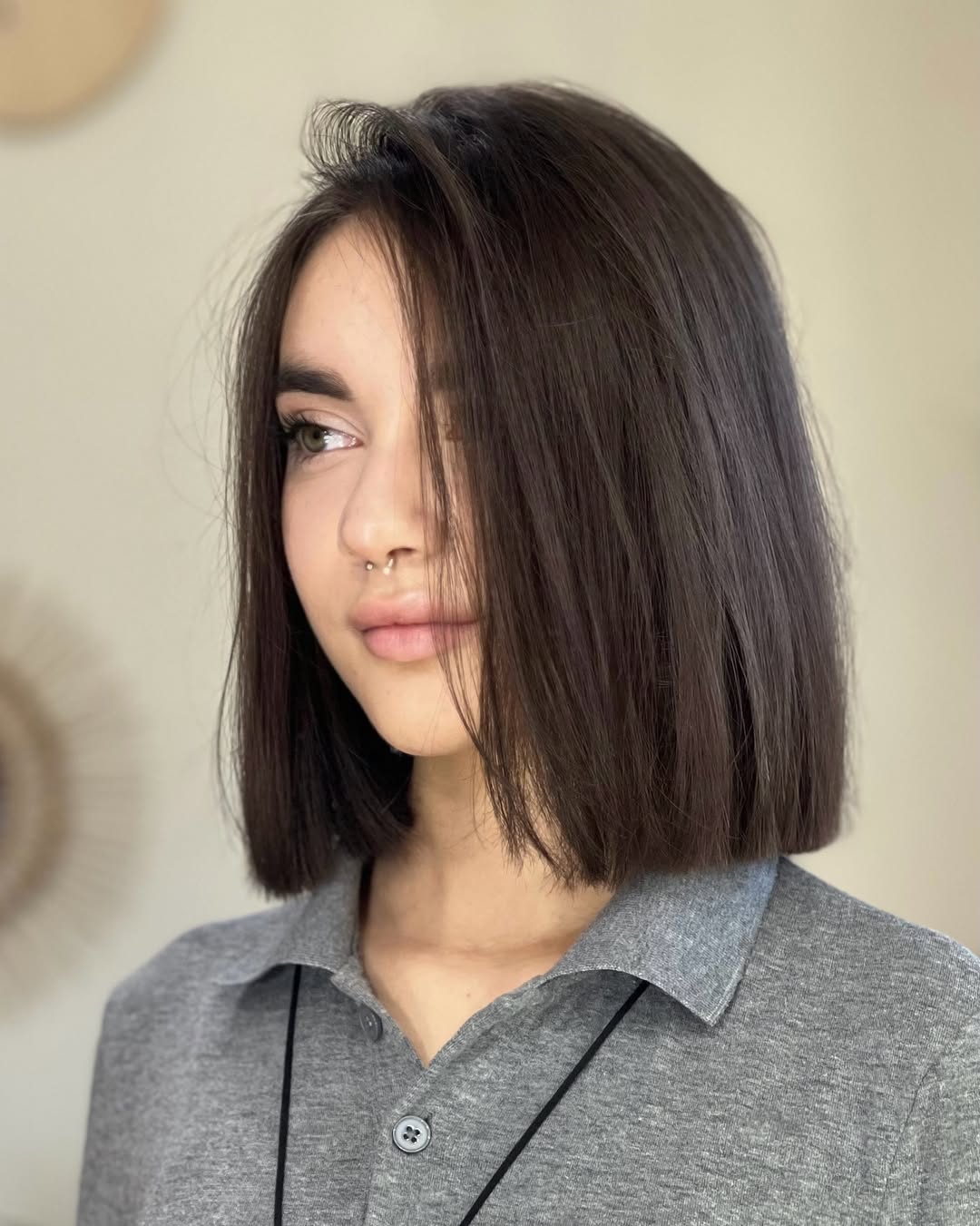 Sleek Dark Chocolate Blunt Bob With Side Part