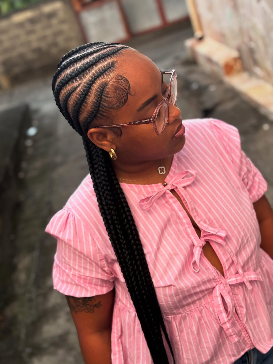 Sleek Side-Swept Cornrows With Long Braids
