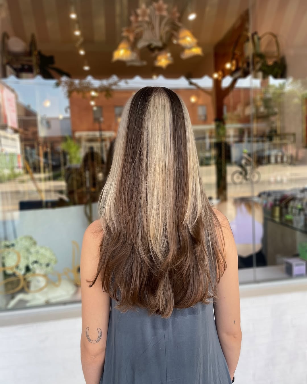 Soft Skunk Stripe Layers On Long Hair