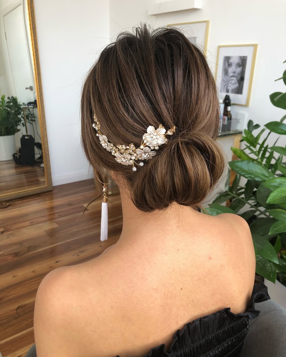 Sophisticated Low Bun With Floral Hair Clip