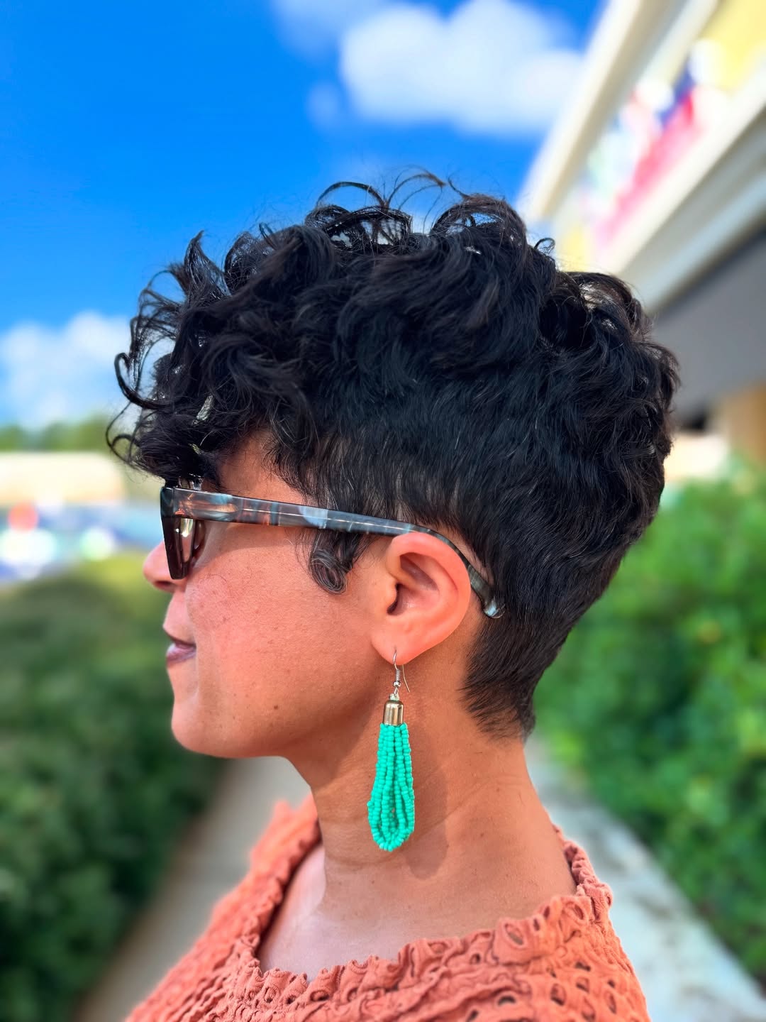 Textured Black Curly Pixie with Undercut Sides