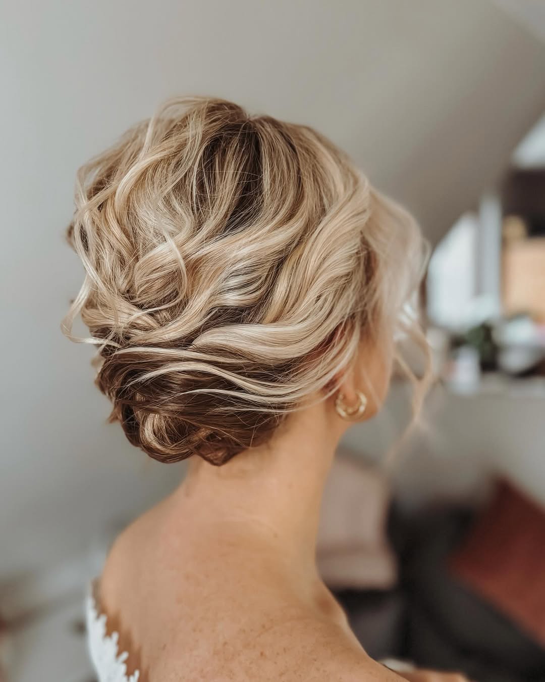 Textured Blonde Updo with Messy Waves
