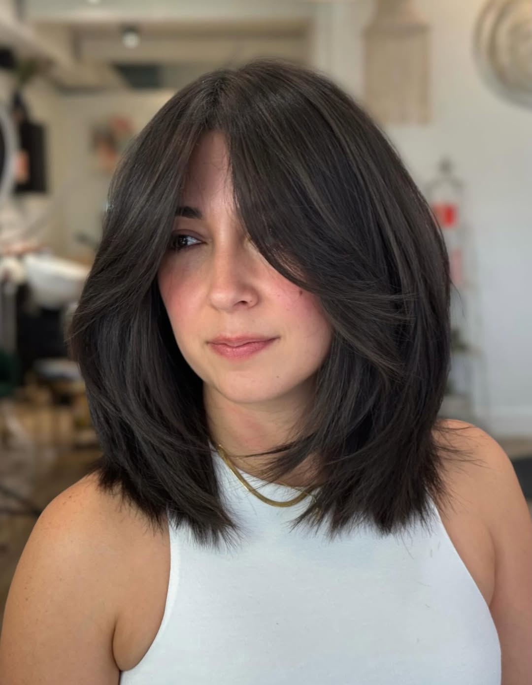 Textured Brunette Lob With Face-Framing Curtain Bangs