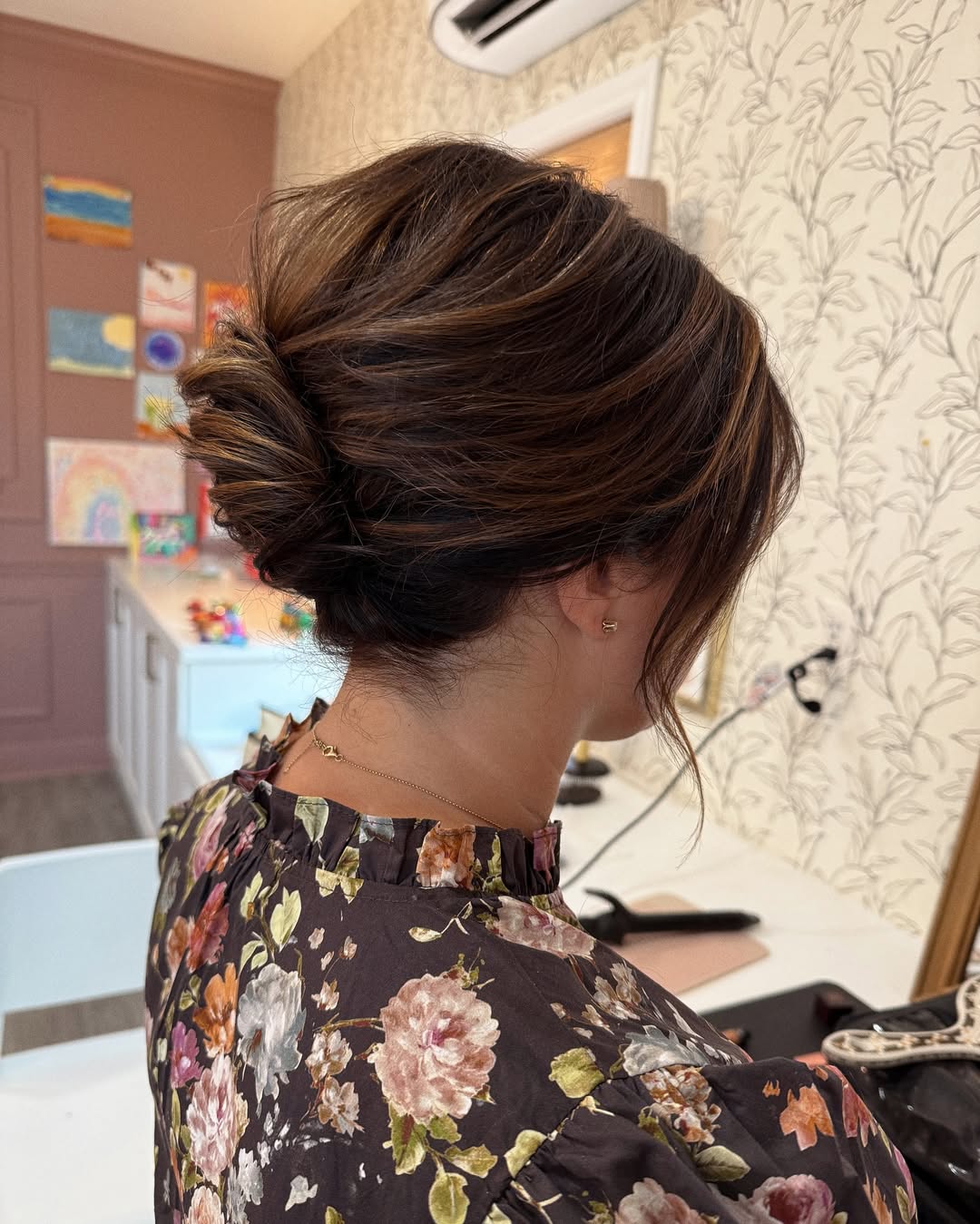 Textured Low Bun Updo With Caramel Highlights