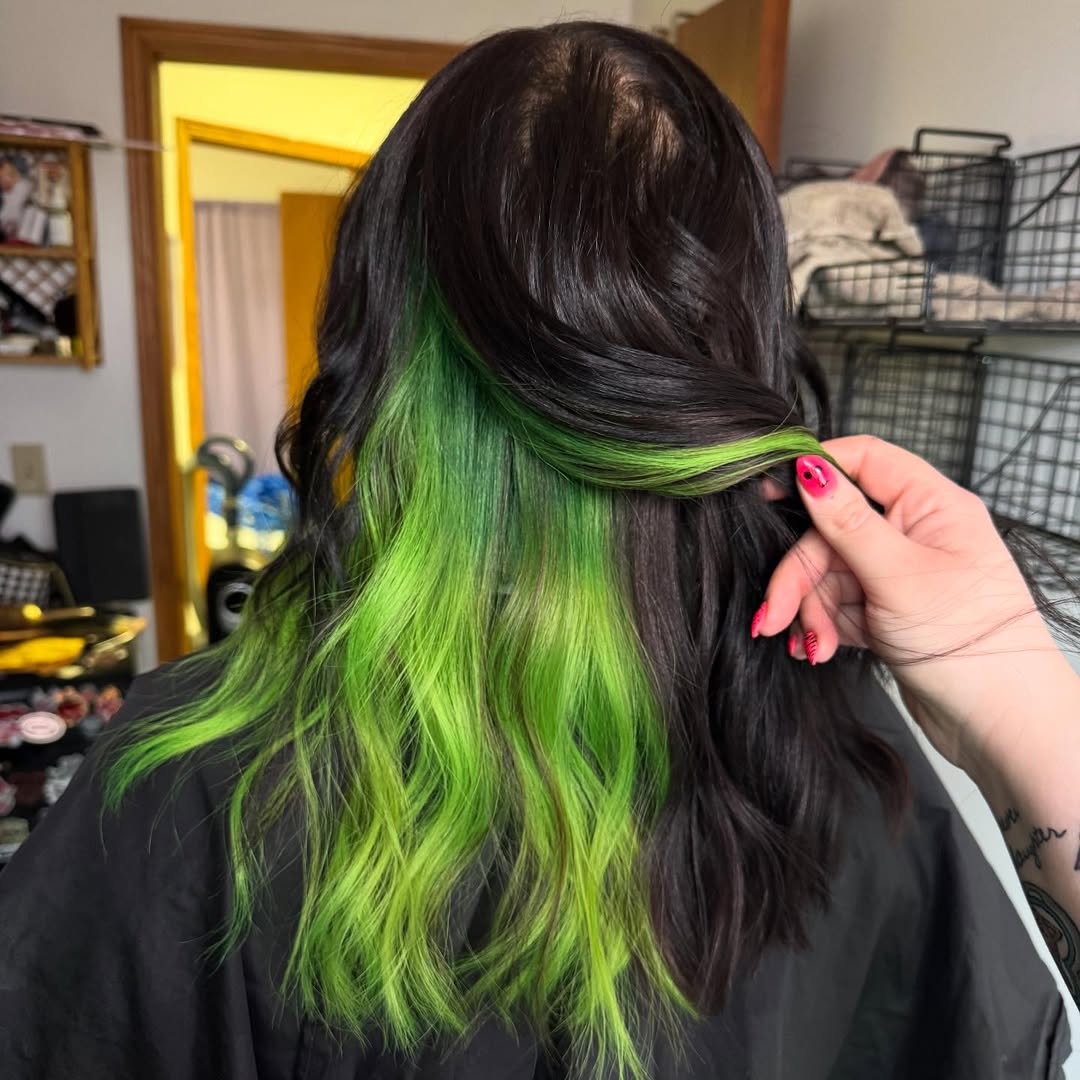 Vivid Green Peekaboo On Dark Wavy Hair