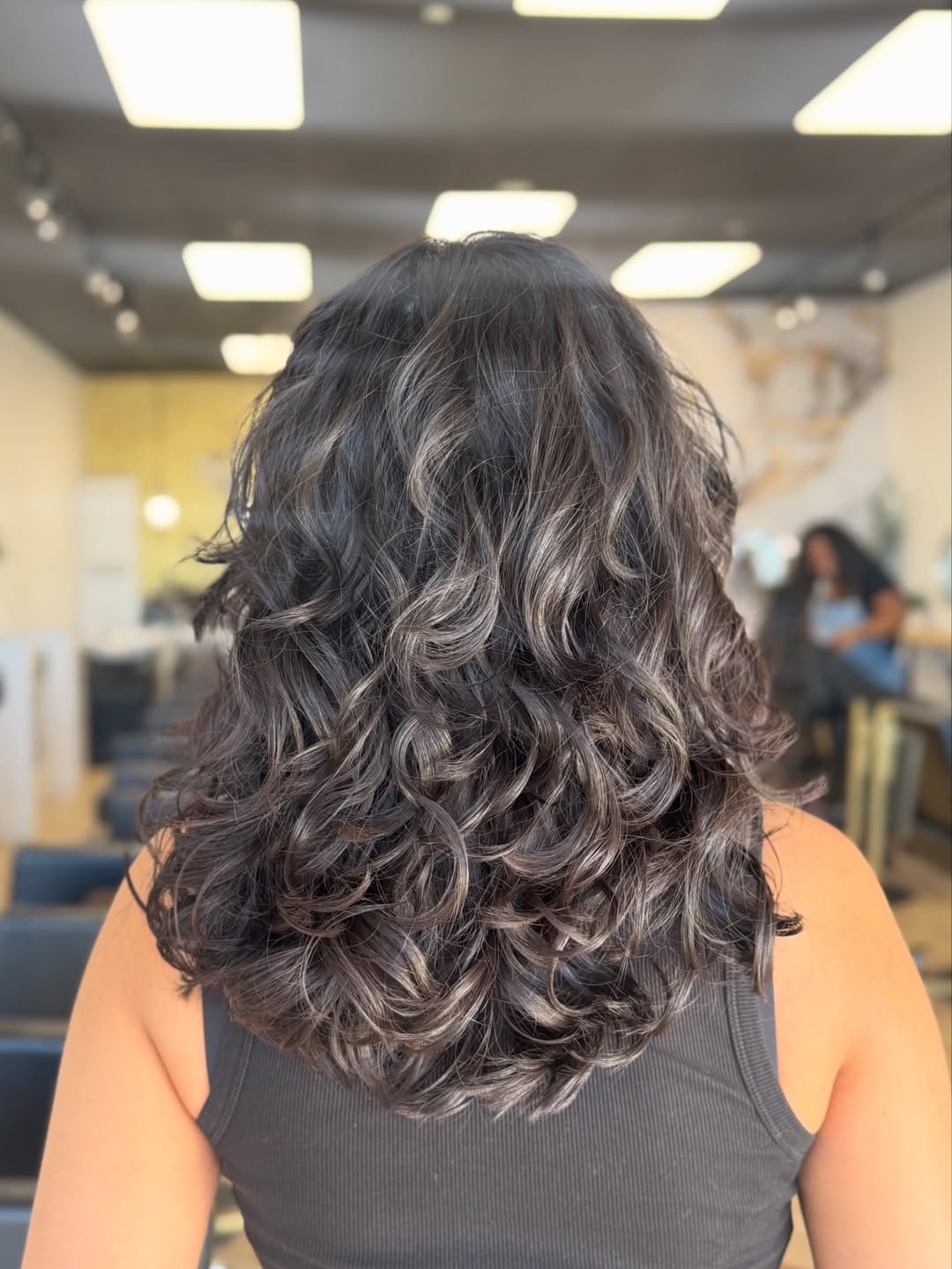 Volume-enhancing Ash Toned Curly Layers
