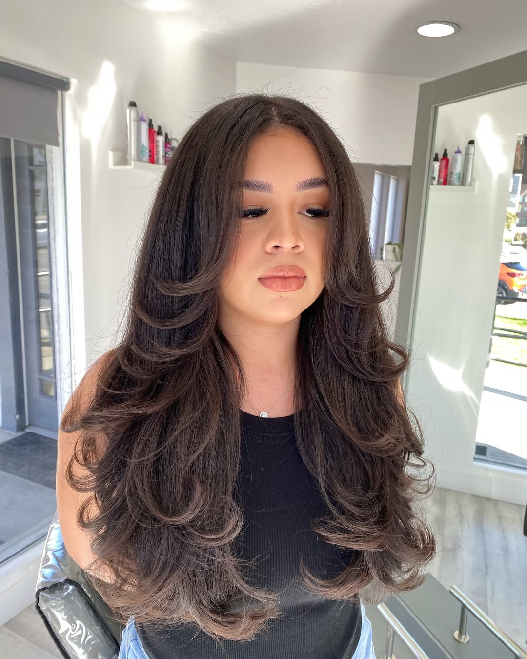 Voluminous Brunette Butterfly Cut With Face-Framing Layers
