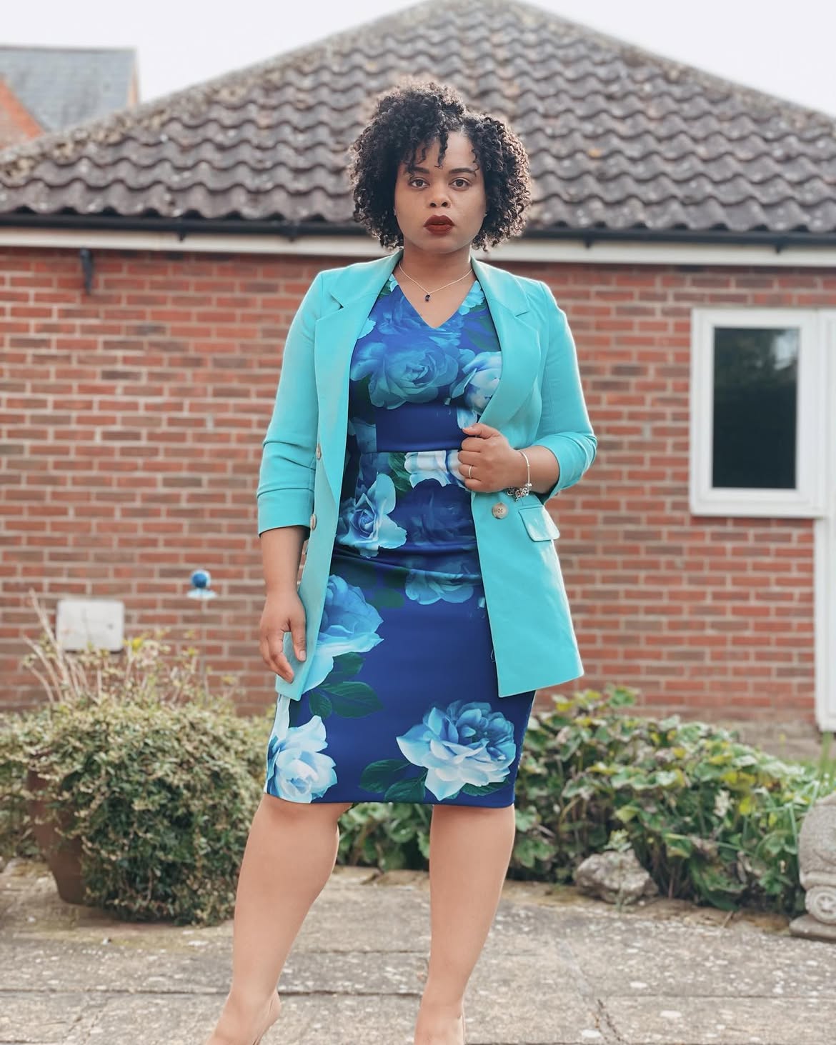 Voluminous Curly Bob With Side-Swept Bangs