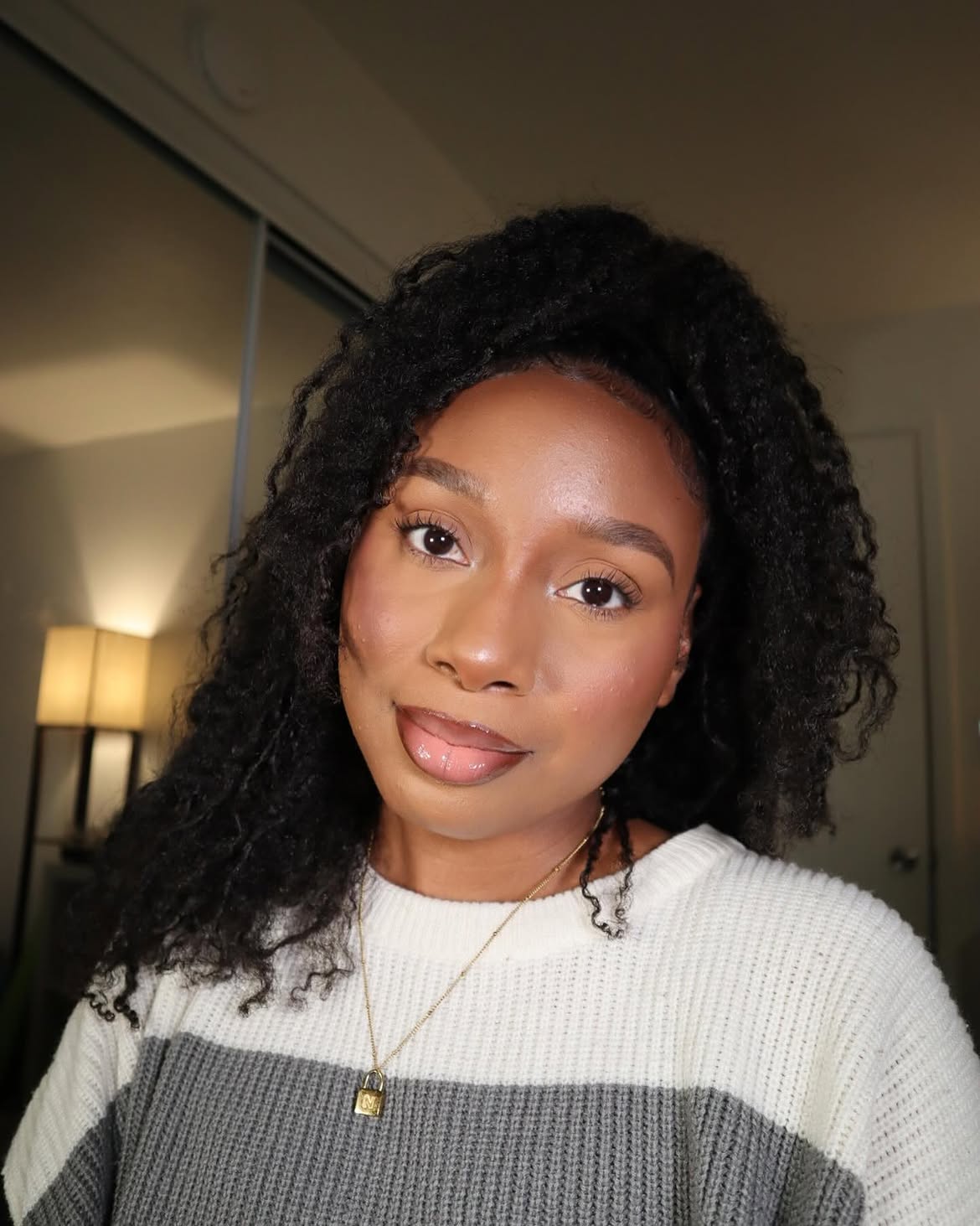 Voluminous Curly High Ponytail With Face Framing Pieces