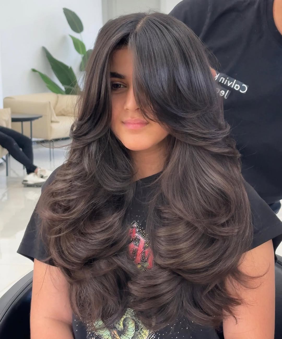 Voluminous Dark Brown Layers With Face-Framing Blowout