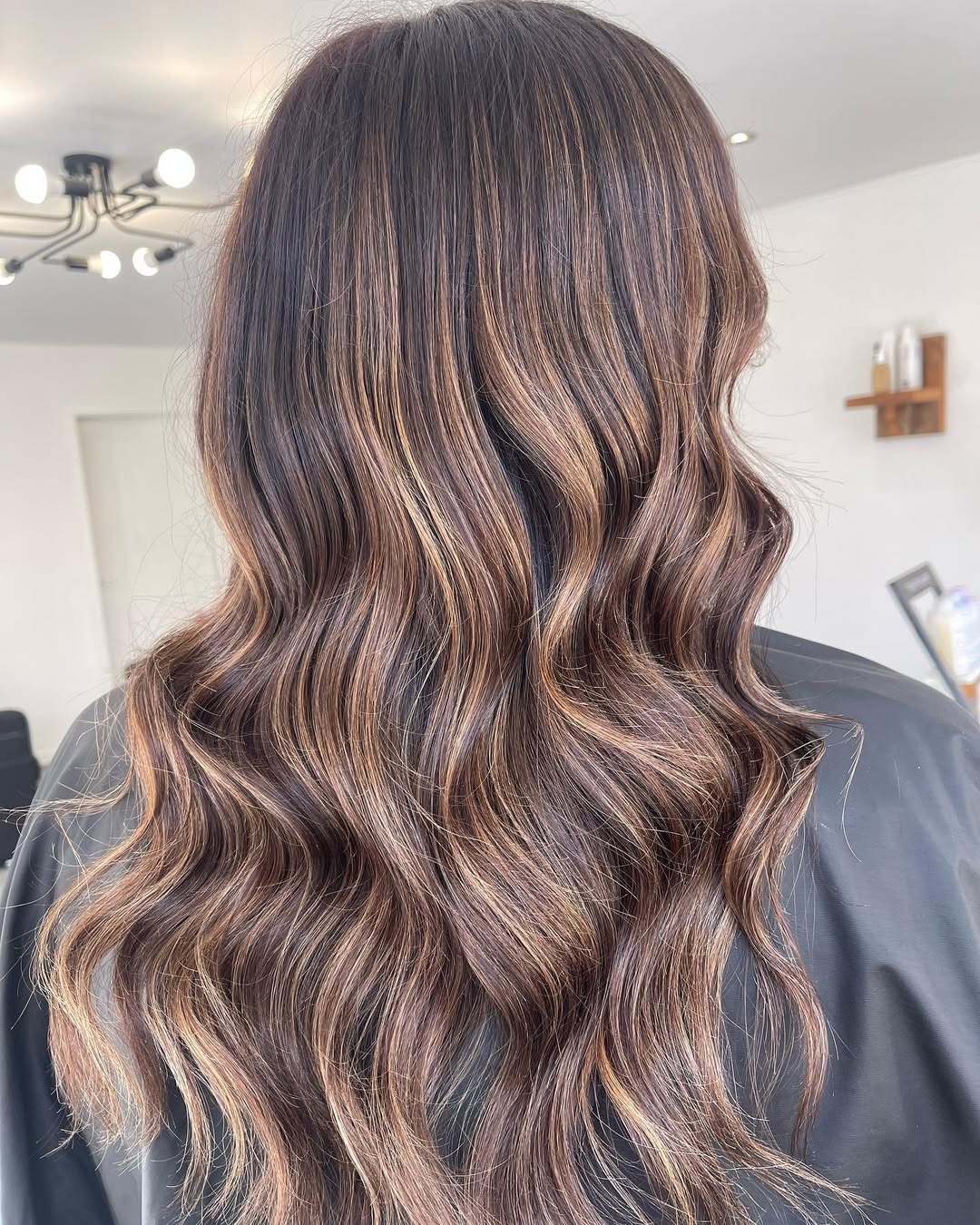 Warm Bronde Balayage With Loose Beach Waves