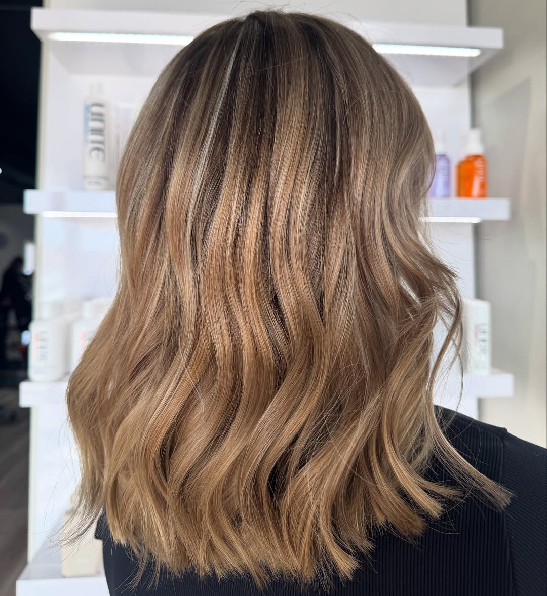 Warm Bronde Balayage With Loose Beach Waves