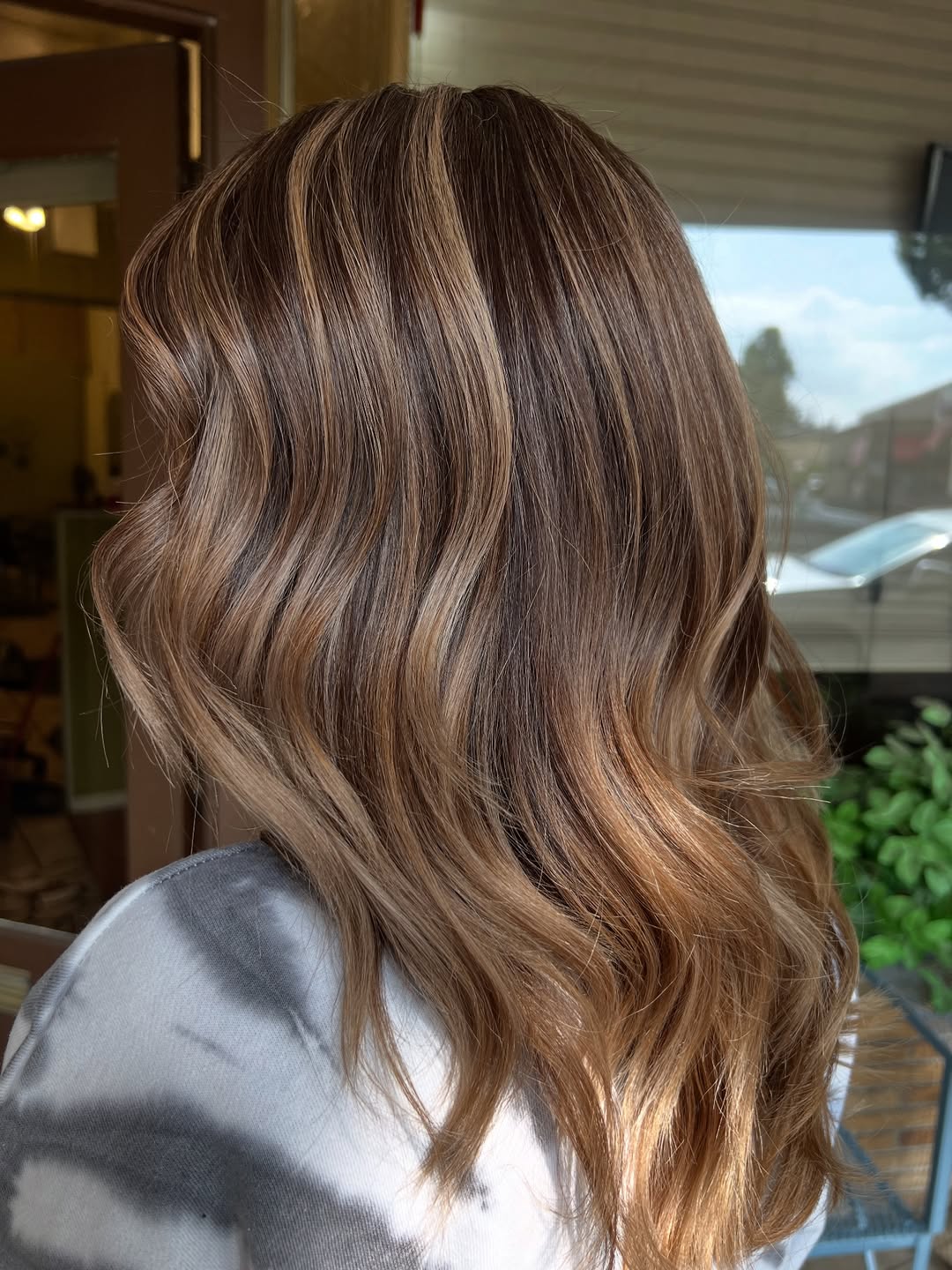 Warm Caramel Blonde Highlights On Wavy Brown Hair