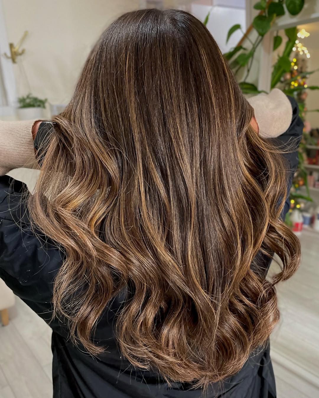 Warm Honey Balayage On Long Brown Waves