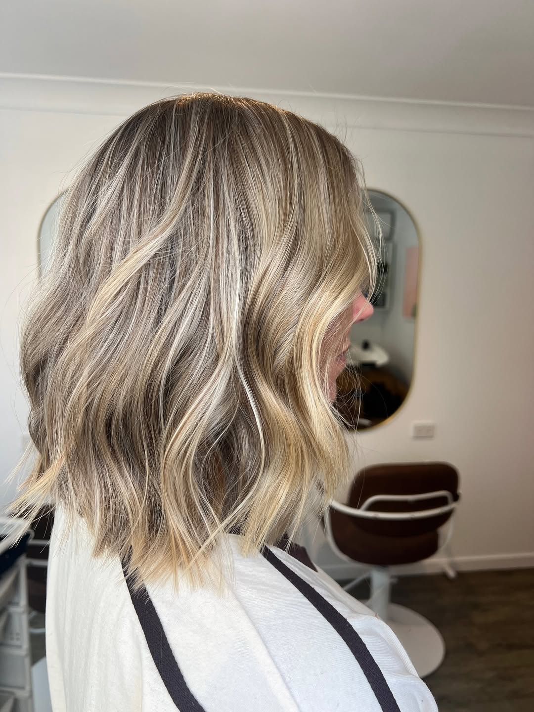 Wavy Ash Blonde Lob with Subtle Highlights
