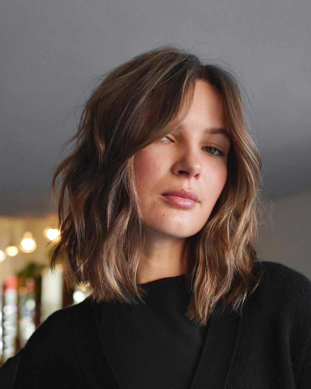 Wavy Honey Blonde Lob With Curtain Bangs