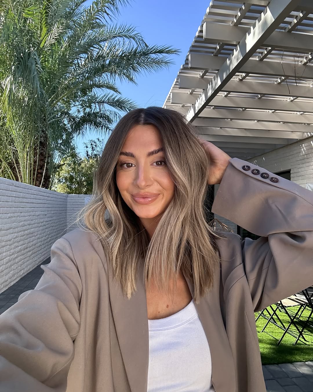 Wavy Lob With Golden Blonde Highlights